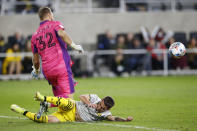 Inter Miami's Nick Marsman, top, makes a save against Columbus Crew's Alexandru Irinel Matan during the second half of an MLS soccer match Saturday, Oct. 16, 2021, in Columbus, Ohio. (AP Photo/Jay LaPrete)