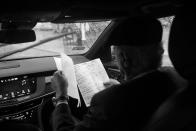 <p>Spencer Leak Sr consults a schedule while en route to a funeral on Chicago’s south side. Though most services are held on Saturdays, he has started to schedule services on Sundays to meet demand from families seeking to bury loved ones killed in Chicago’s uptick of violence. (Photo: Jon Lowenstein/NOOR for Yahoo News) </p>