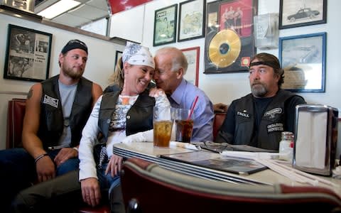 Joe Biden's talks to customers during a stop at Cruisers Diner in Seaman, Ohio, in 2012 - Credit: AP