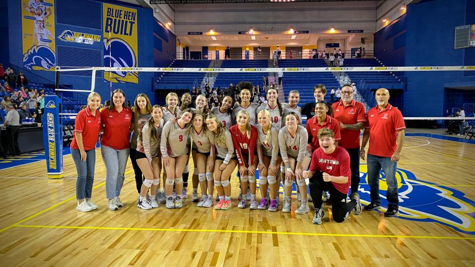 The Smyrna Eagles pose after winning a semifinal matchup against Caesar Rodney to advance to the volleyball state title game.