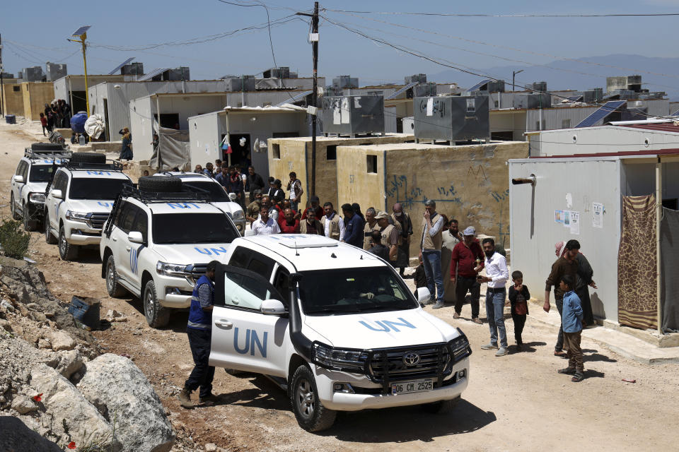 A UN convoy arrives at a camp in Idlib province, Syria, Wednesday, May 3, 2023. Three months after a massive earthquake hit Turkey and Syria, living conditions remain dire in Syria's rebel-held northwest. Three U.N. officials who visited Syria's Idlib province on Wednesday said some progress has been made but still more needs to be done to help the population in the rebel-held northwest that is home to some 4 million people. (AP Photo/Omar Albam)