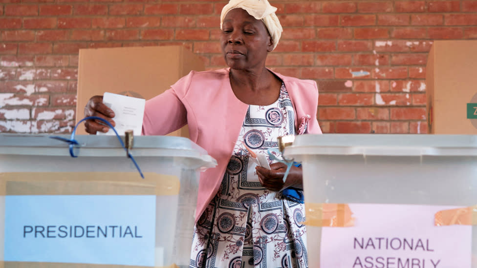 A voter casts her ballot at Emakhandeni Secondary School during general elections in Bulawayo, Zimbabwe, August 23, 2023