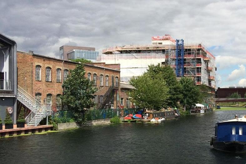 Campaigners have fought to stop the bridge being built on land currently occupied by part of Vittoria Wharf (pictured left) (Save Hackney Wick)