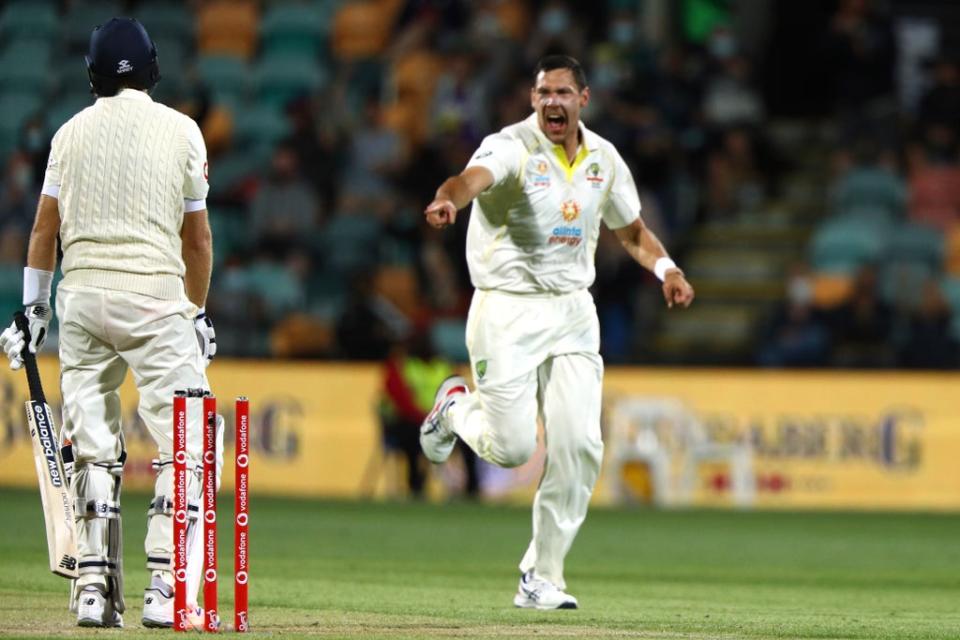 England captain Joe Root (left) is bowled by Scott Boland as Australia cruised to a 4-0 Ashes victory in Hobart (Tertius Pickard/AP) (AP)