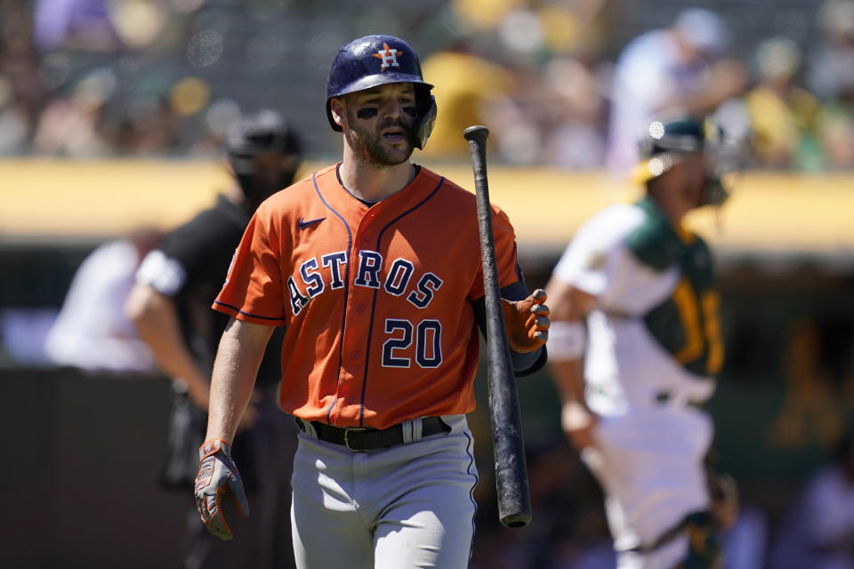 Houston Astros' Chas McCormick walks toward the dugout after striking out against the Oakland Athletics during the ninth inning of a baseball game in Oakland, Calif., Wednesday, July 27, 2022. (AP Photo/Jeff Chiu)