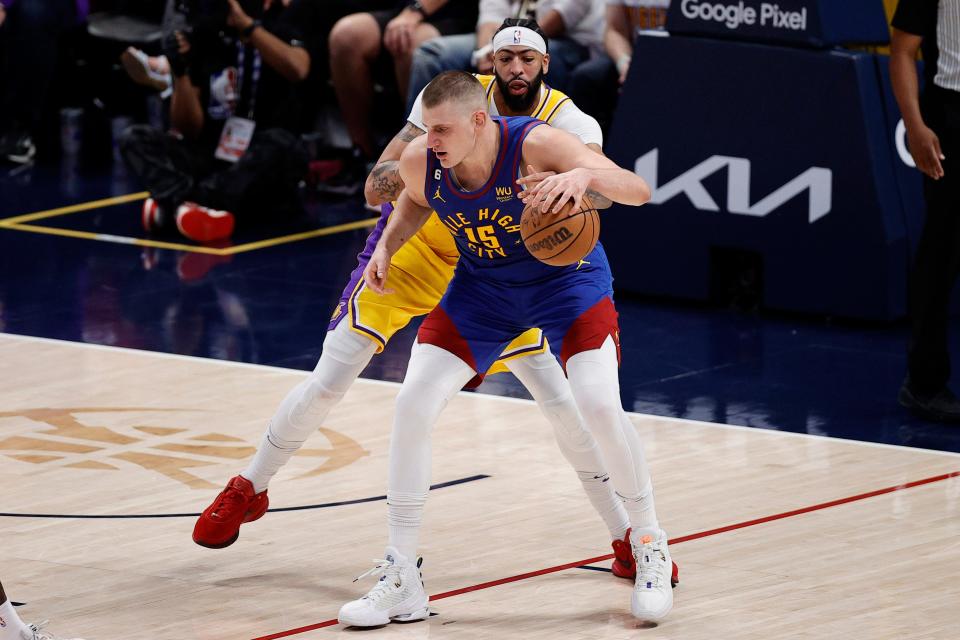 Lakers forward Anthony Davis defends Nuggets center Nikola Jokic in the third quarter of Game 1.