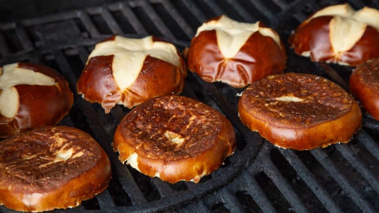 pretzel buns on a grill