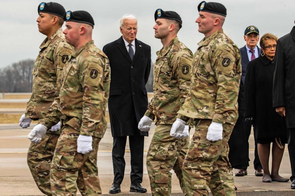 President Joe Biden and government officials watch the procession as an Army carry team moves the transfer cases containing the remains of Army Reserve Sgts. William Jerome Rivers, 46, of Willingboro, N.J.; Kennedy Sanders, 24, of Waycross, Ga.; and Breonna Moffett, 23, of Savannah, Ga., at Dover Air Force Base on Friday, Feb. 2, 2024. Rivers, Sanders and Moffett were killed by a drone strike Sunday, Jan. 28, 2024, on their base in Jordan near the Syrian border.