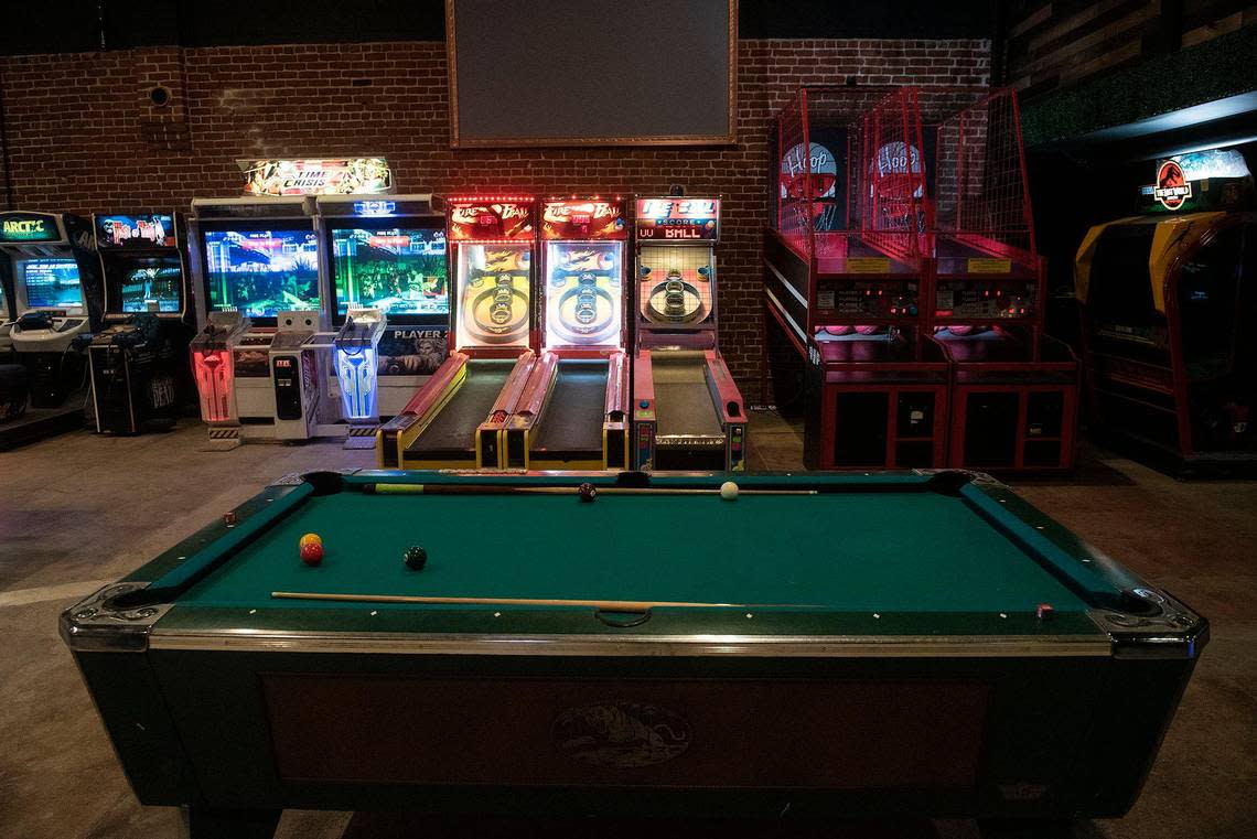 Arcade games and pool table inside Joystiq, a bar, arcade and restaurant venue located at 325 W. Main Street in Merced, Calif., on Wednesday, Oct. 5, 2022.