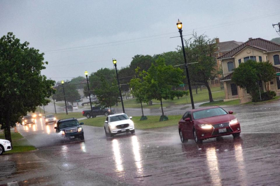 Rain pours down in Fort Worth on Wednesday, April 26, 2023. Hail, damaging winds and tornadoes could occur due to severe weather Wednesday evening.