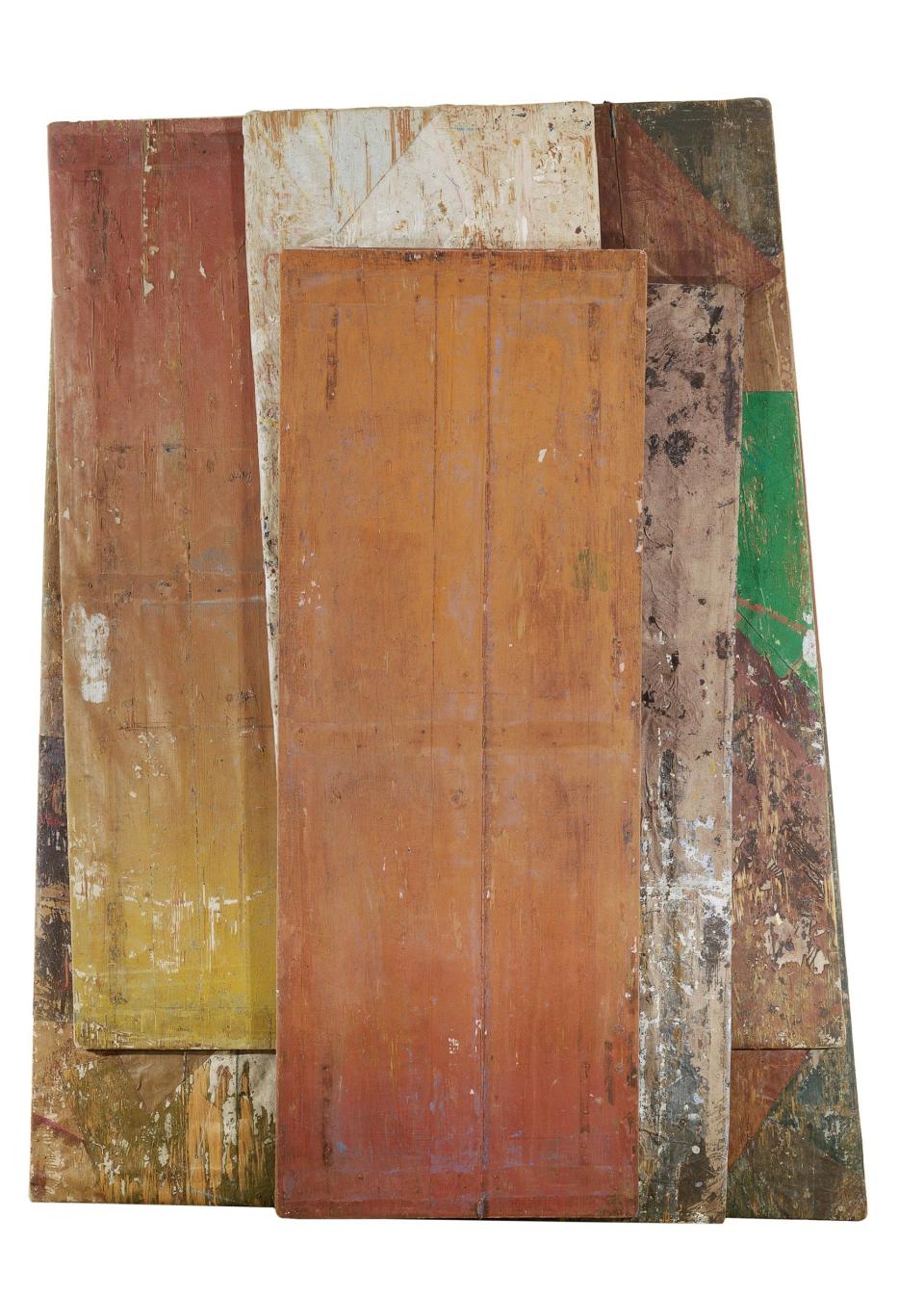 Table, 1978, by Mick Moon, acrylic on canvas: he covered the underside of his studio table with pigment ranging from red to orange, and transferred a print to canvas;  the remaining panels were cast from the table top and bear the traces of previous operations and previous castings