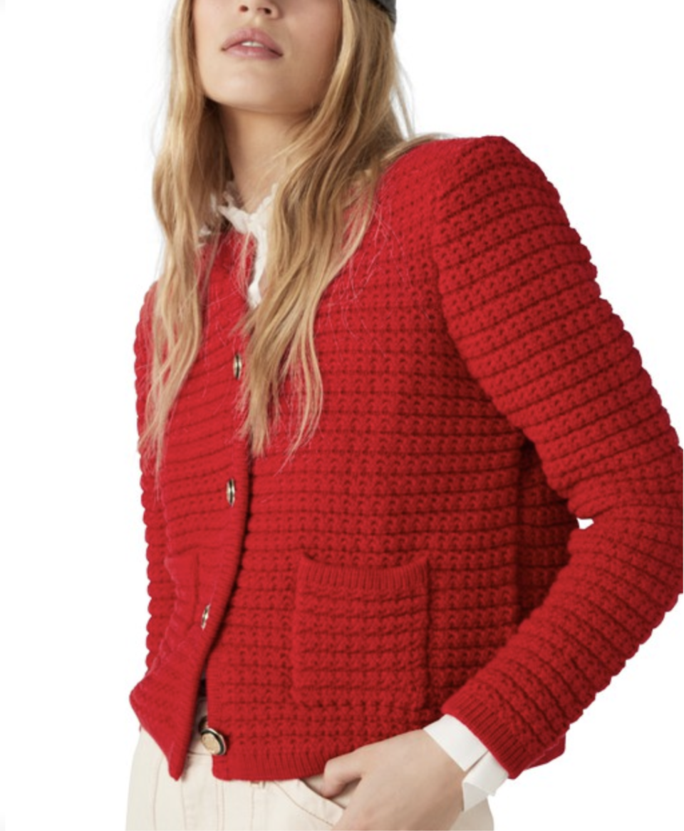 model wearing red chunky buttoned BA&SH Gaspard Cardigan (Photo via 24S)