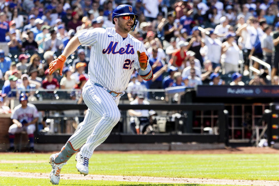 New York Mets' Pete Alonso runs on his double during the fourth inning of a baseball game against the Philadelphia Phillies, Sunday, Aug. 14, 2022, in New York. (AP Photo/Julia Nikhinson)