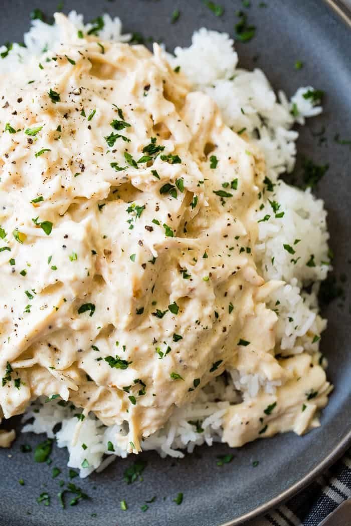 <strong>Get the <a href="https://ohsweetbasil.com/crockpot-chicken/" target="_blank">Crockpot Chicken and Rice</a> recipe from Oh Sweet Basil</strong>