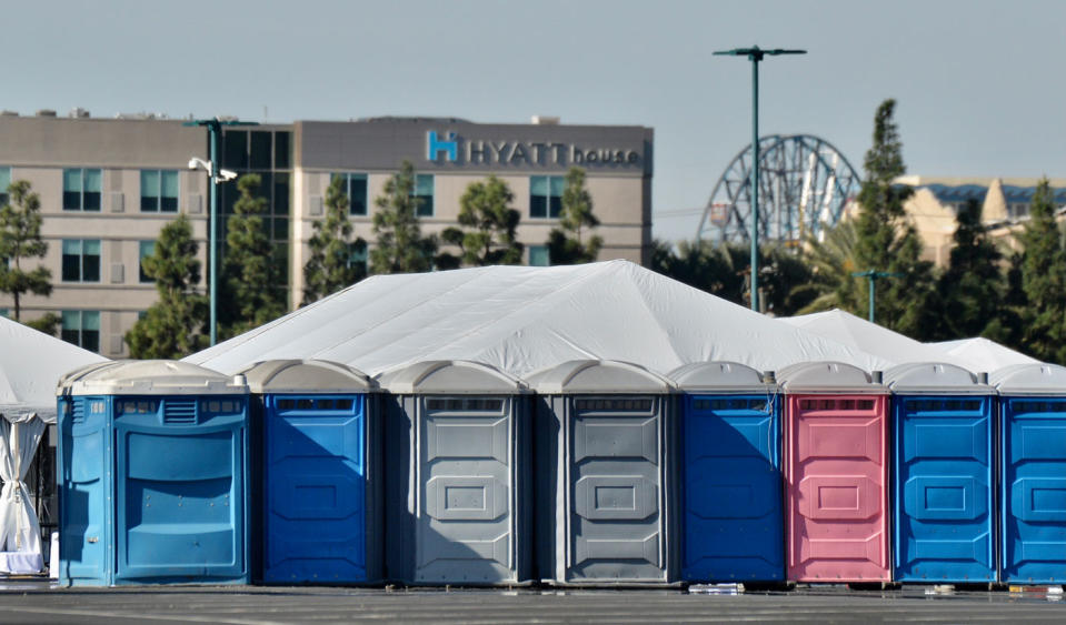 Port-a-loos seen lined up ate the vaccination site.