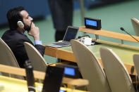 A member of the Pakistani delegation listens as Foreign Minister of India Subrahmanyam Jaishankar addresses the 77th session of the United Nations General Assembly, Saturday, Sept. 24, 2022 at U.N. headquarters. (AP Photo/Mary Altaffer)