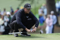 Phil Mickelson lines up a putt on the seventh hole during the final round of the Masters golf tournament at Augusta National Golf Club on Sunday, April 9, 2023, in Augusta, Ga. (AP Photo/Mark Baker)