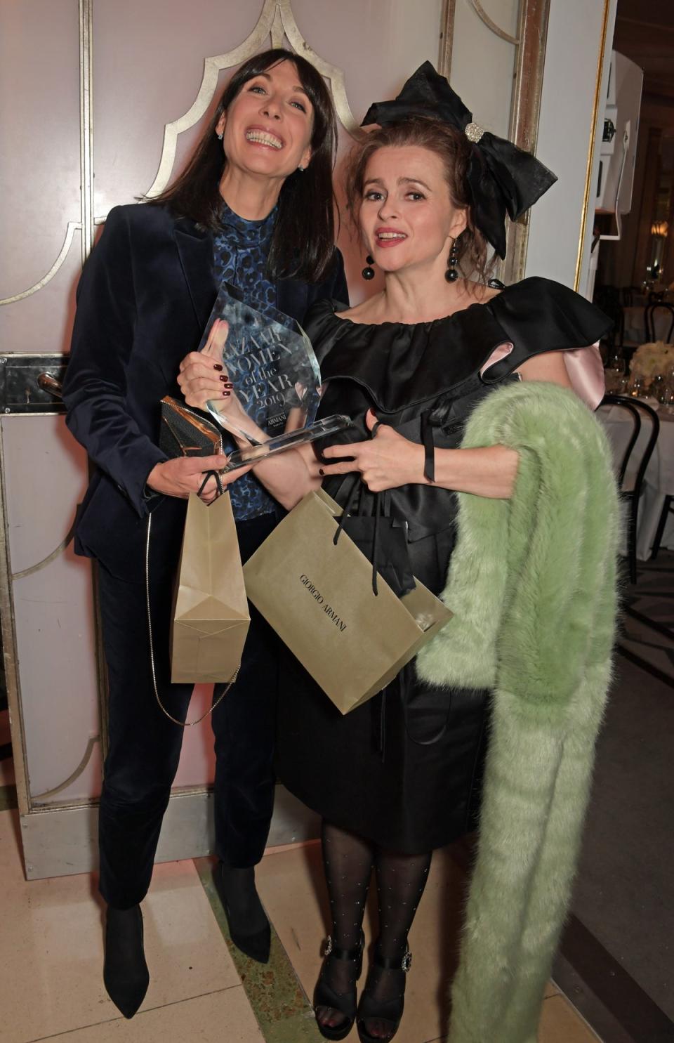 Samantha Cameron and Helena Bonham Carter, winner Of The British Icon Award, attend the Harper's Bazaar Women of the Year Awards 2019 (Dave Benett/Getty Images for Har)