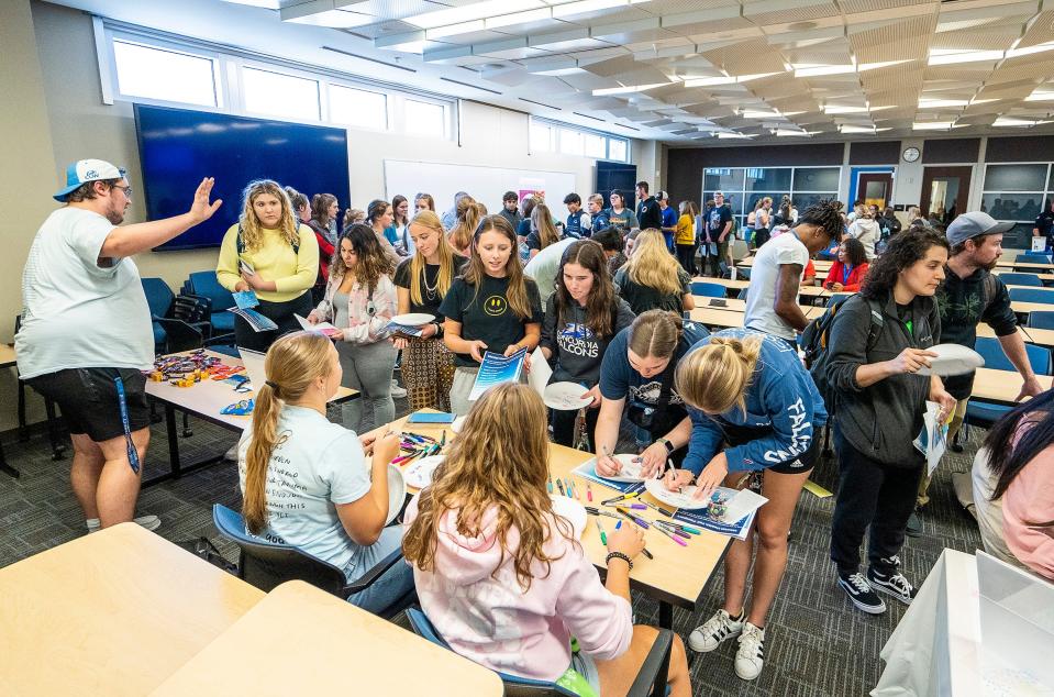 Students participate in the mental health resource fair at Concordia University Wisconsin in Mequon in September.