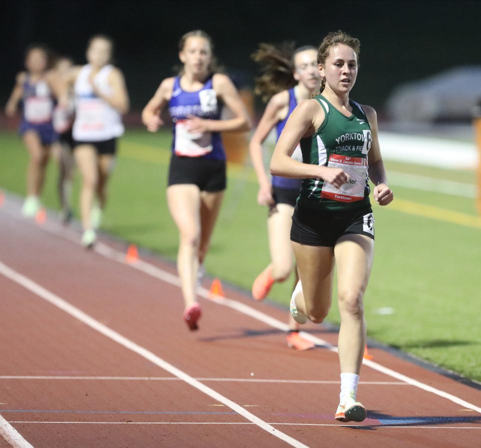 Yorktown's Sydney Leitner runs the 3200-meter during Day 2 of the Loucks Games track and field meet at White Plains High School on Friday, May 13, 2022.