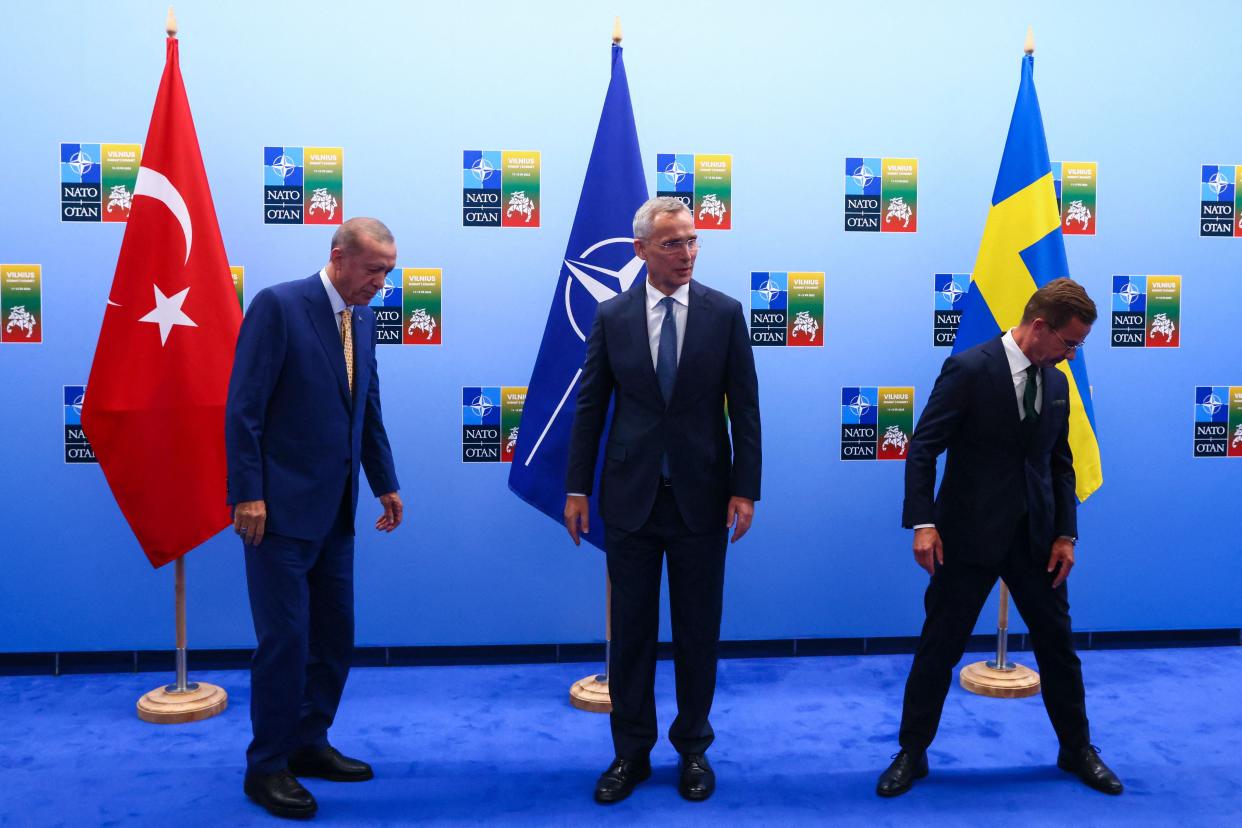 Turkish President Tayyip Erdogan, NATO Secretary-General Jens Stoltenberg and Swedish Prime Minister Ulf Kristersson look on, prior to their meeting, on the eve of a NATO summit, in Vilnius on July 10, 2023. (POOL/AFP via Getty Images)