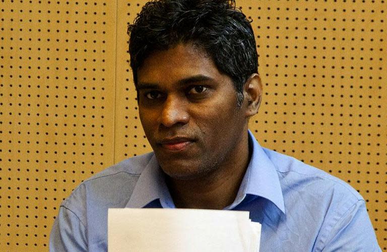 Singapore&#39;s Wilson Perumal attends his match-fixing trial at the Lapland district court in Rovaniemi, on June 22, 2011