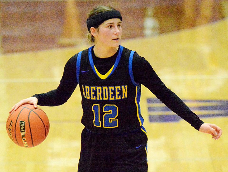 Aberdeen Central's Taryn Hettich handles the ball during a high school girls basketball game on Monday, Feb. 20, 2023 in the Watertown Civic Arena.