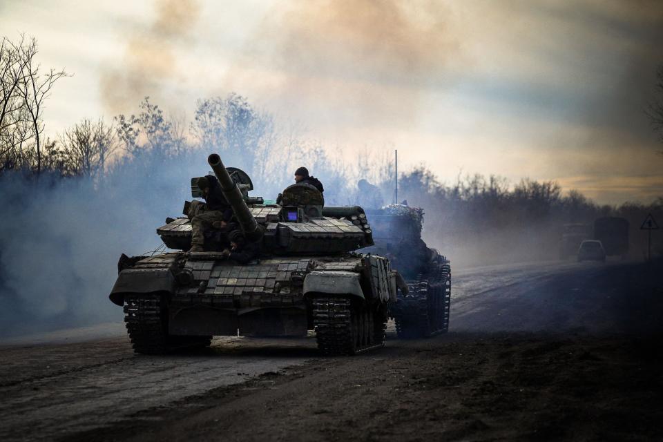 A Ukrainian tank rolls on a road near Bakhmut, in the Donetsk region on Wednesday amid the Russian invasion of Ukraine (AFP via Getty Images)