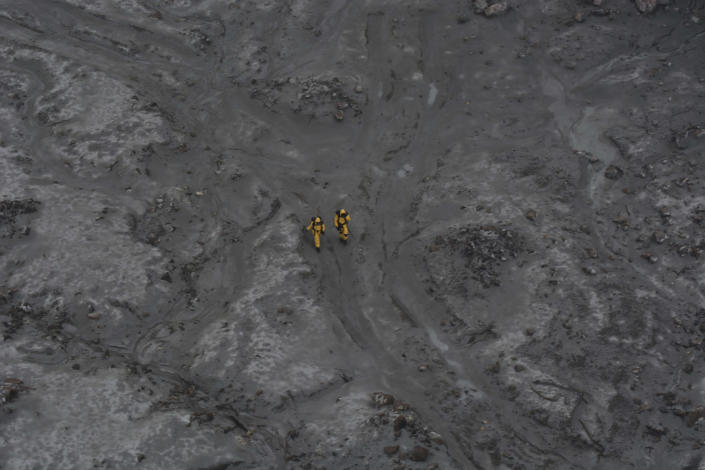This photo released by the New Zealand Defence Force shows an operation to recover bodies from White Island after a volcanic eruption in Whakatane, New Zealand, Friday, Dec. 13, 2019. A team of eight New Zealand military specialists landed on White Island early Friday to retrieve the bodies of victims after the Dec. 9 eruption. (New Zealand Defence Force via AP)