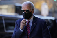 FILE - In this Nov. 23, 2020, file photo President-elect Joe Biden walks from his motorcade to speak to members of the media in Wilmington, Del. The big tech companies enjoyed a cozy relationship with the Obama-Biden administration. Joe Biden is back now, ready to take the presidential mantle in January. But times have changed, and Big Tech is hardly expecting a return to those halcyon days. (AP Photo/Carolyn Kaster, File)