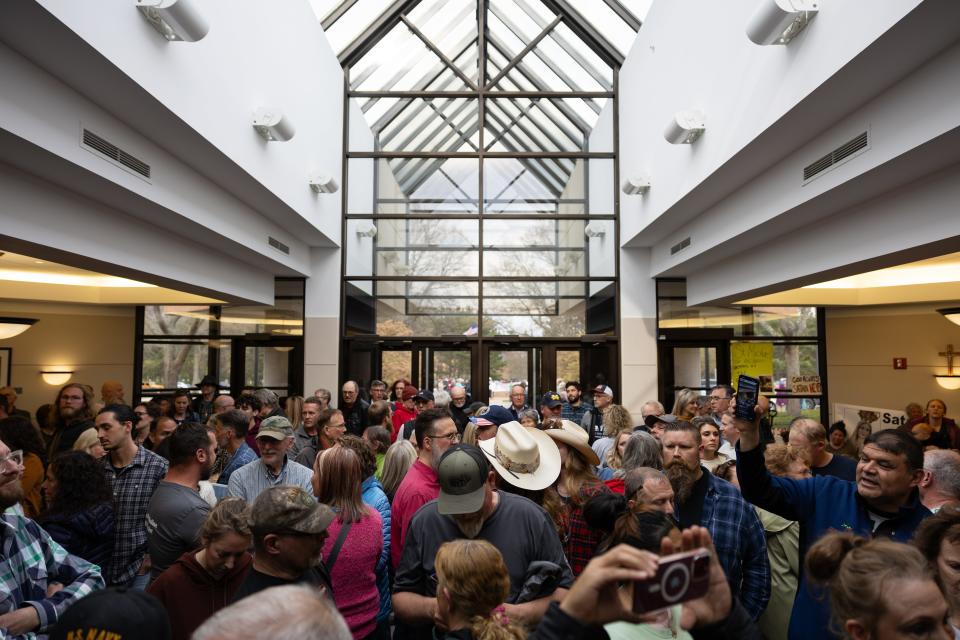 Protestors and supporters gather at the Fillmore Complex on Tuesday, April 23.