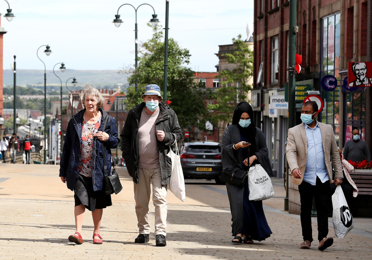 People shopping in Oldham, the town in Greater Manchester has seen cases of coronavirus rise in the area.