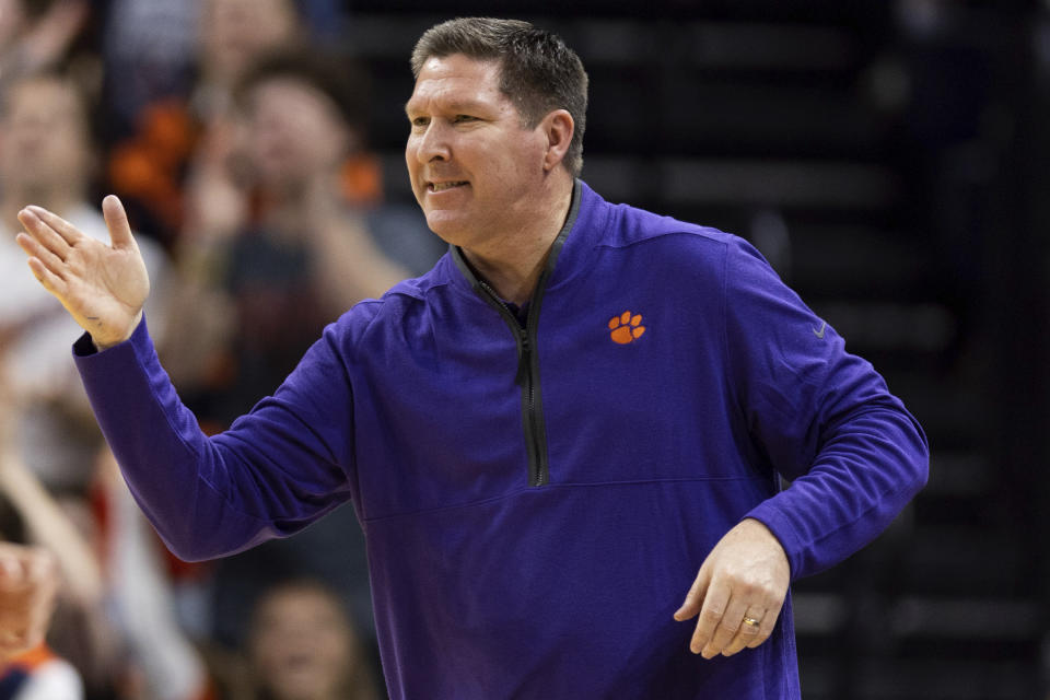 FILE - Clemson head coach Brad Brownell gestures to his players during the first half of an NCAA college basketball game against Virginia in Charlottesville, Va., Tuesday, Feb. 28, 2023. (AP Photo/Mike Kropf, File)