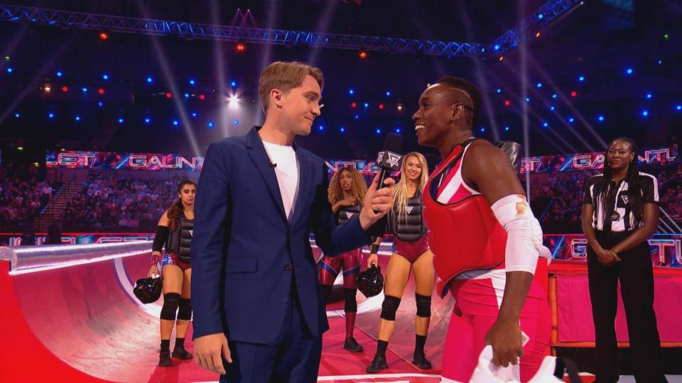 Sonia Mkoloma (right) looks on as Barney Walsh chats with contestant Tasha Lawrence. (BBC)