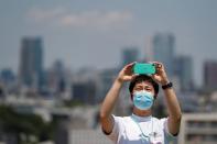 Japan Air Self-Defense Force stages a flyover to salute the medical workers at the frontline of the fight against the coronavirus disease (COVID-19), in Tokyo