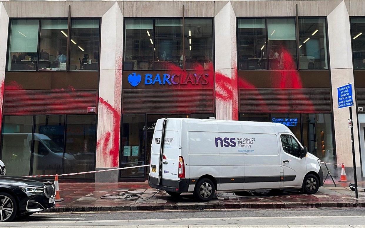 The front of the bank's Moorgate branch splattered with red paint