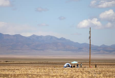 A man at his camp across from the Little A'Le'Inn as an influx of tourists responding to a call to 'storm' Area 51, a secretive U.S. military base believed by UFO enthusiasts to hold government secrets about extra-terrestrials, is expected in Rachel