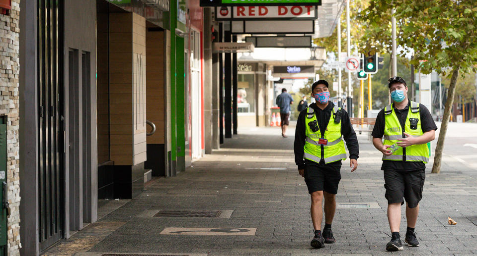City of Perth Safe City Patrol workers are seen in Perth, Monday, April 26, 2021. Perth and Peel region are expected to come out of a three day lockdown at midnight but mask will still be compulsory until at least 12:01am next Saturday when restrictions are reviewed. (AAP Image/Richard Wainwright) NO ARCHIVING