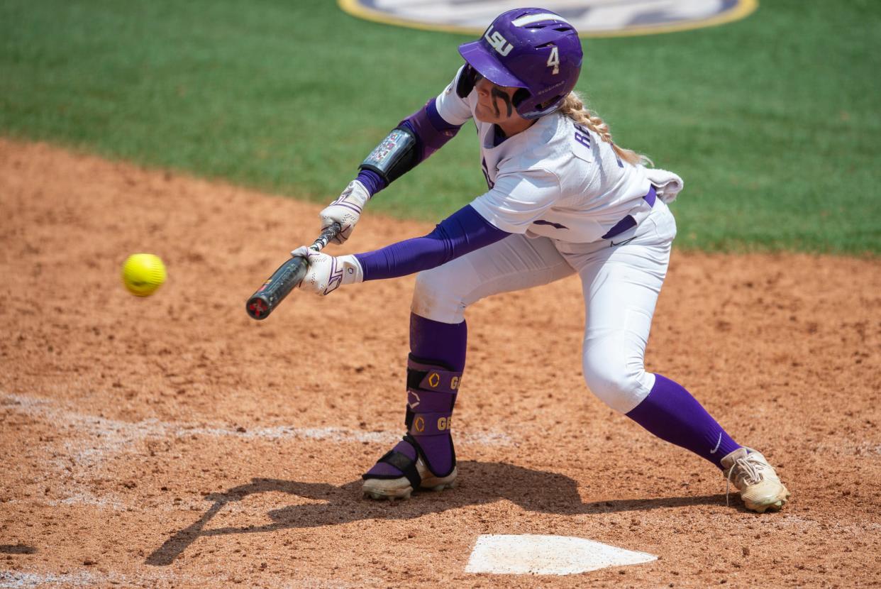 LSU Tigers outfielder McKenzie Redoutey (4) attempts a bunt during the SEC softball tournament at Jane B. Moore Field in Auburn, Ala., on Wednesday, May 8, 2024. LSU Tigers defeated Alabama Crimson Tide 3-2 in 14 innings.