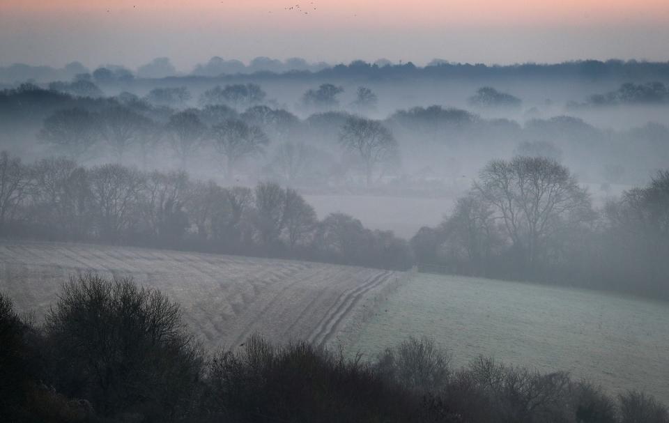 A yellow weather warning for freezing fog has been issued on Christmas day by the Met Office. Pictured is the Wiltshire countryside. PA.