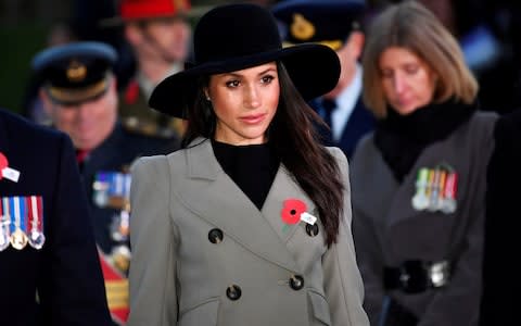 Meghan Markle wore a poppy at the Anzac Day service - Credit: Toby Melville /Getty