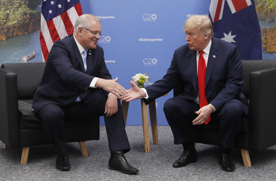 FILE - In this Nov. 30, 2018, file photo, Australian Prime Minister Scott Morrison, left, meets with U.S. President Donald Trump at the G20 in Buenos Aires, Argentina. Australia. Saturday, May 18, 2019 is the last possible date that Morrison could have realistically chosen to hold an election. (AP Photo/Pablo Martinez Monsivais, File)