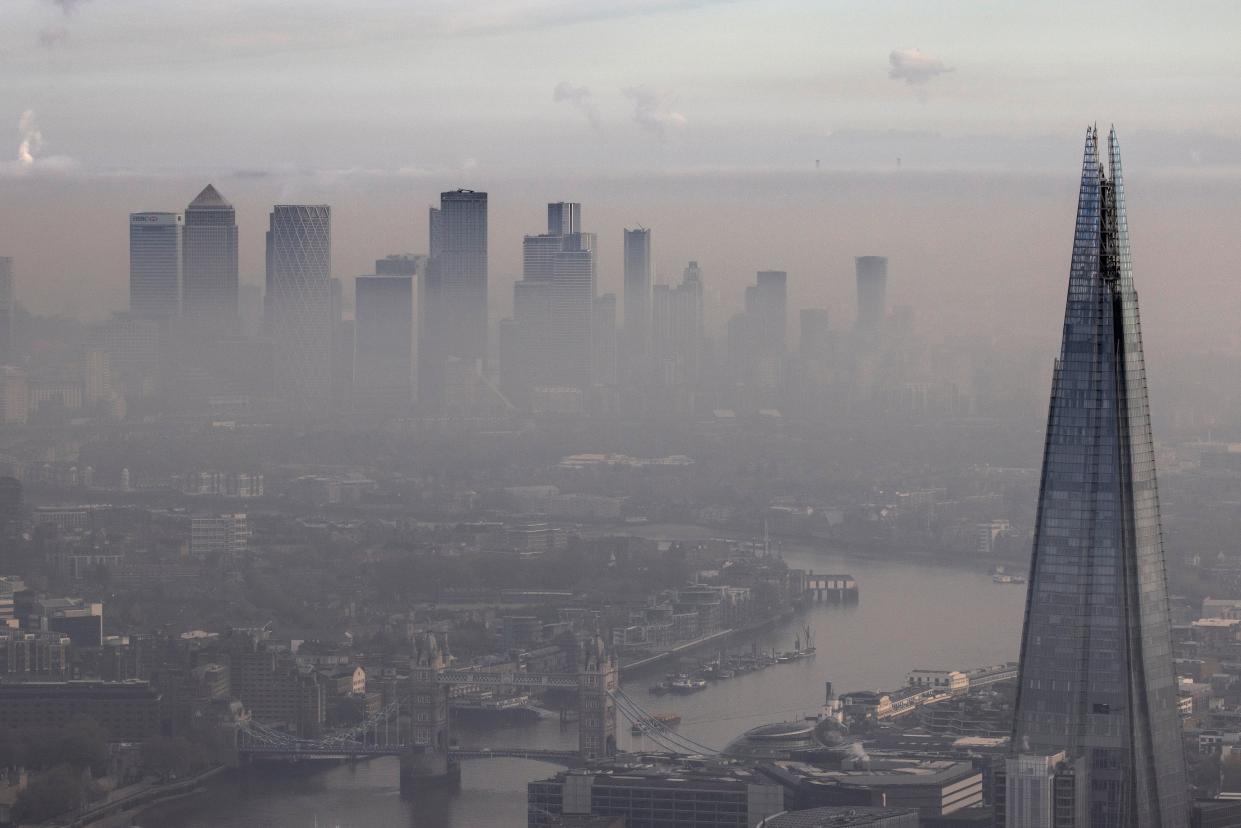 Fog shrouds the Shard and the view towards the Canary Wharf in London (Getty Images)