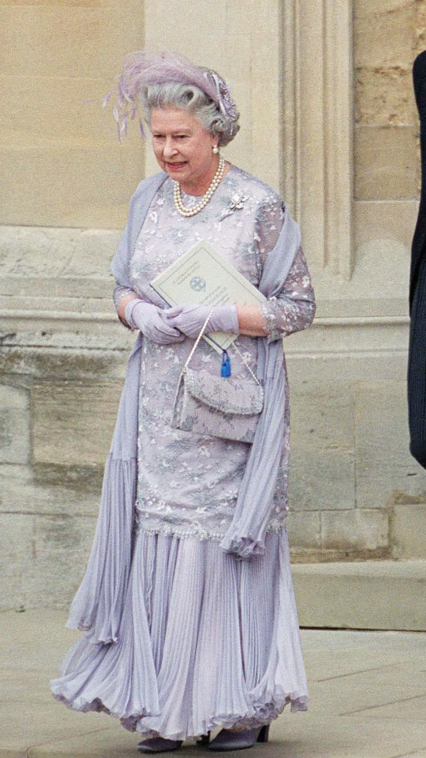 Queen Elizabeth leaves St George's Chapel after the wedding of Prince Edward and Sophie in 1999