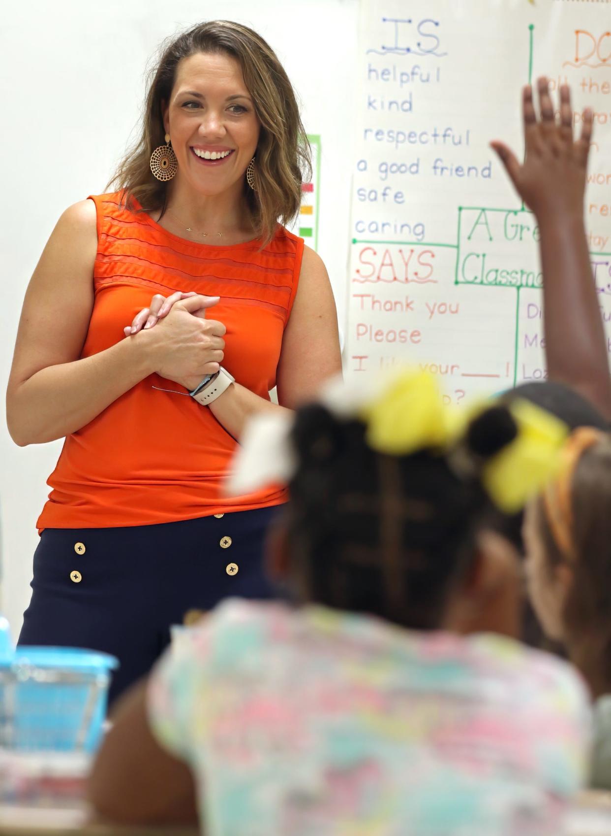 Dentist Dr. Sara Karner answers questions from students in Jennifer Stallings’ 2nd grade class at Jefferson Elementary in Shelby early Friday morning, Aug. 18, 2023, as part of their Suit up and Show up event.