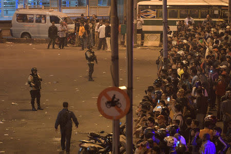 Police secure the area following an explosion at a bus stop in Kampung Melayu, East Jakarta, Indonesia May 24, 2017 in this photo taken by Antara Foto. Antara Foto/Sigid Kurniawan/ via REUTERS