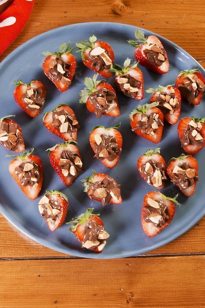 <p><a href="https://www.delish.com/uk/cooking/recipes/a29955174/chocolate-cuties-recipe/" rel="nofollow noopener" target="_blank" data-ylk="slk:Chocolate dipped fruit;elm:context_link;itc:0;sec:content-canvas" class="link ">Chocolate dipped fruit</a> is so last year. These little guys are for the Nutella lover in your life.</p><p>Get the <a href="https://www.delish.com/uk/cooking/recipes/a30775545/nutella-stuffed-strawberries-recipe/" rel="nofollow noopener" target="_blank" data-ylk="slk:Nutella Stuffed Strawberries;elm:context_link;itc:0;sec:content-canvas" class="link ">Nutella Stuffed Strawberries</a> recipe.</p>