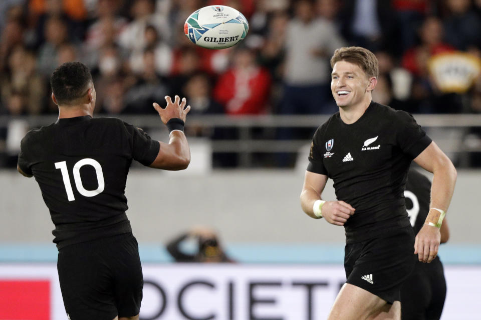 FILE - In this Nov. 1, 2019, file photo, New Zealand's Beauden Barrett, right, celebrates with teammate Richie Mo'unga during the Rugby World Cup bronze final game against Wales at Tokyo Stadium, in Tokyo. New All Blacks head coach Ian Foster opted for the in-form Mo'unga at No. 10 ahead of the incumbent Barrett, a two-time World Rugby Player of the Year, who will start at fullback in the first Bledisloe Cup test against Australia, Sunday, Oct. 11, 2020. (AP Photo/Mark Baker, File)