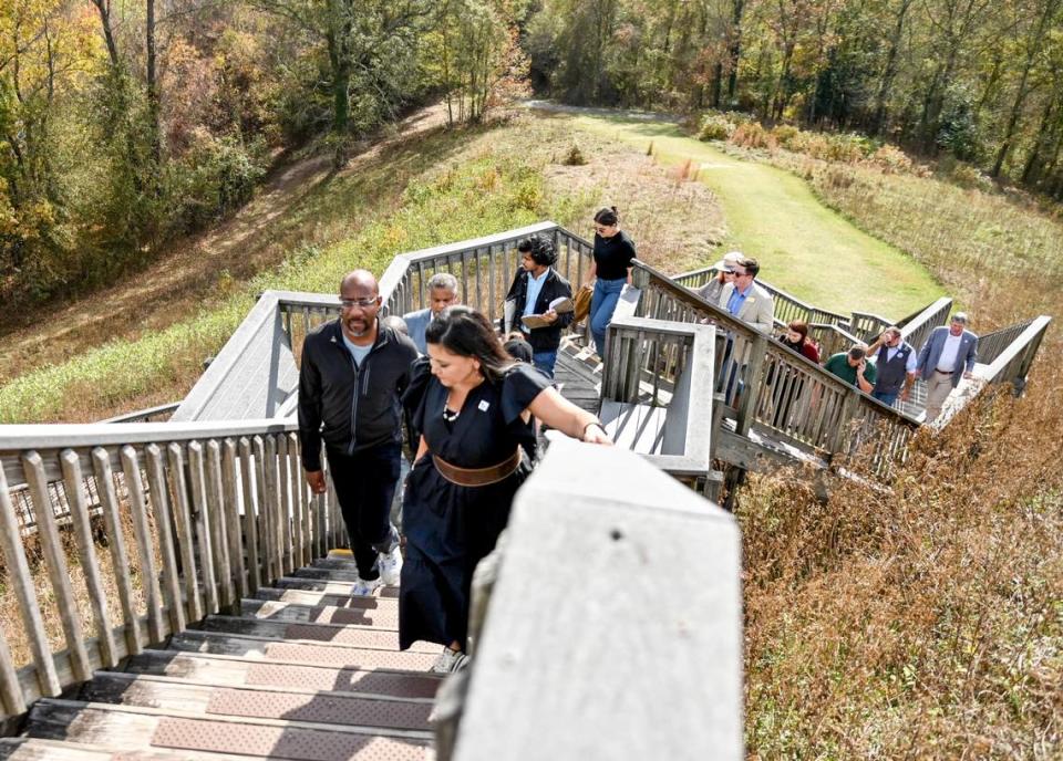 Sen. Warnock climbs the steps to the Great Temple Mound.