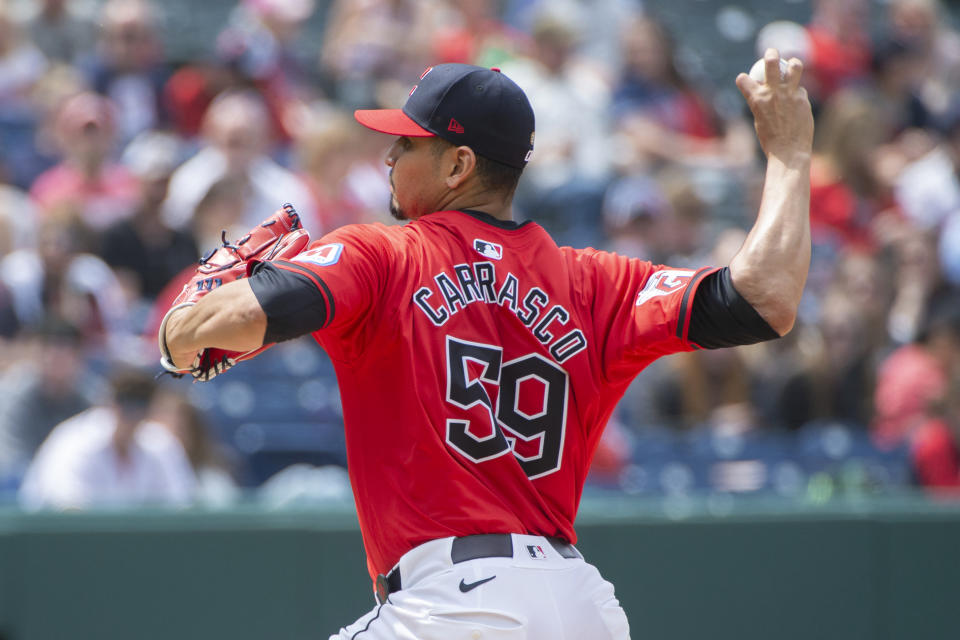Cleveland Guardians starting pitcher Carlos Carrasco delivers against the Los Angeles Angels during the sixth inning of a baseball game in Cleveland Sunday, May 5, 2024. (AP Photo/Phil Long)